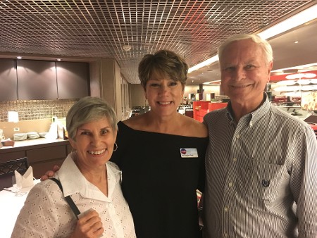 Elderly Couple With Cruise Staff